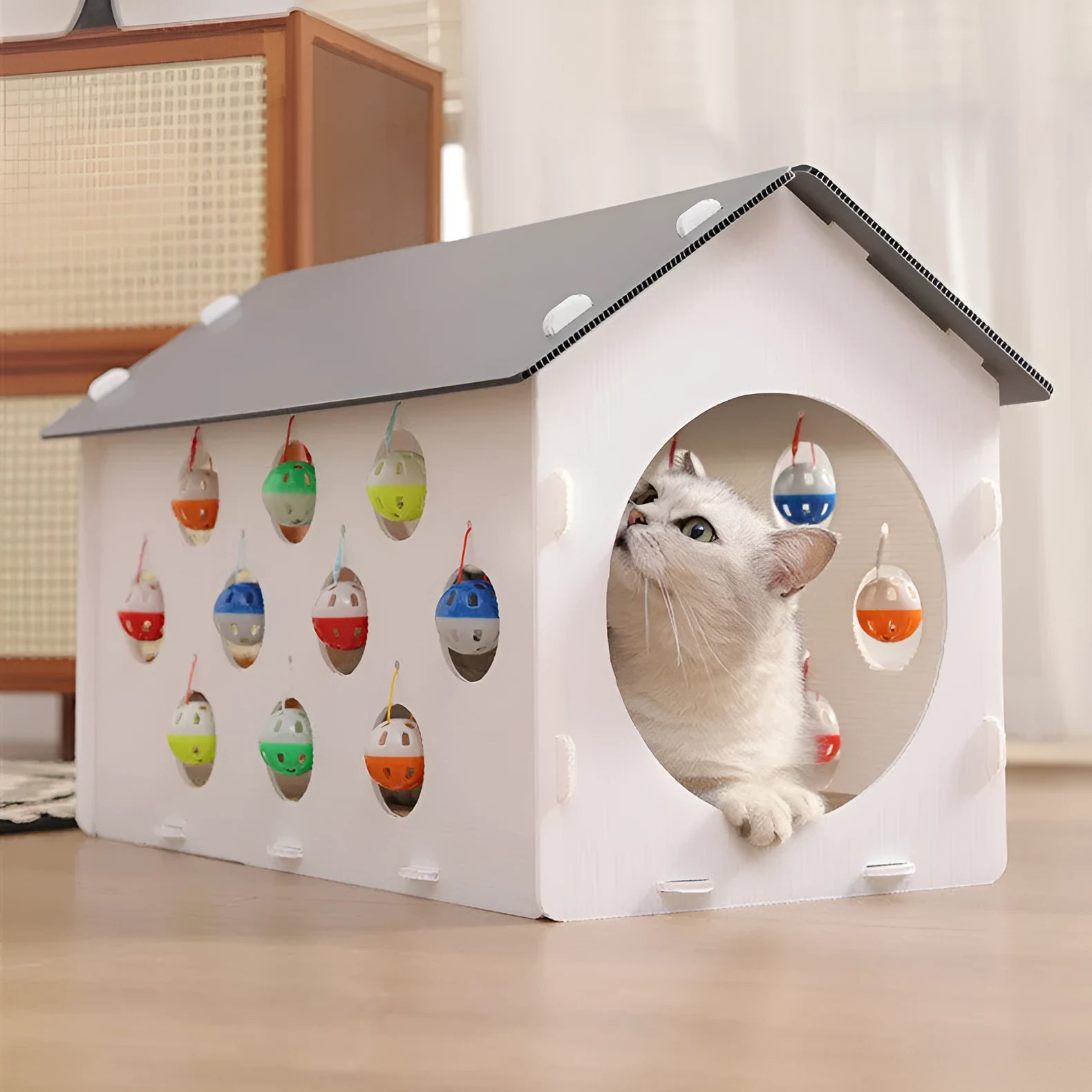 Plastic integrated cat scratch board toy with a tunnel and a bell ball