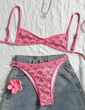 Pink printed two-piece bikini set with shoulder straps and exposed back cut-out for ladies