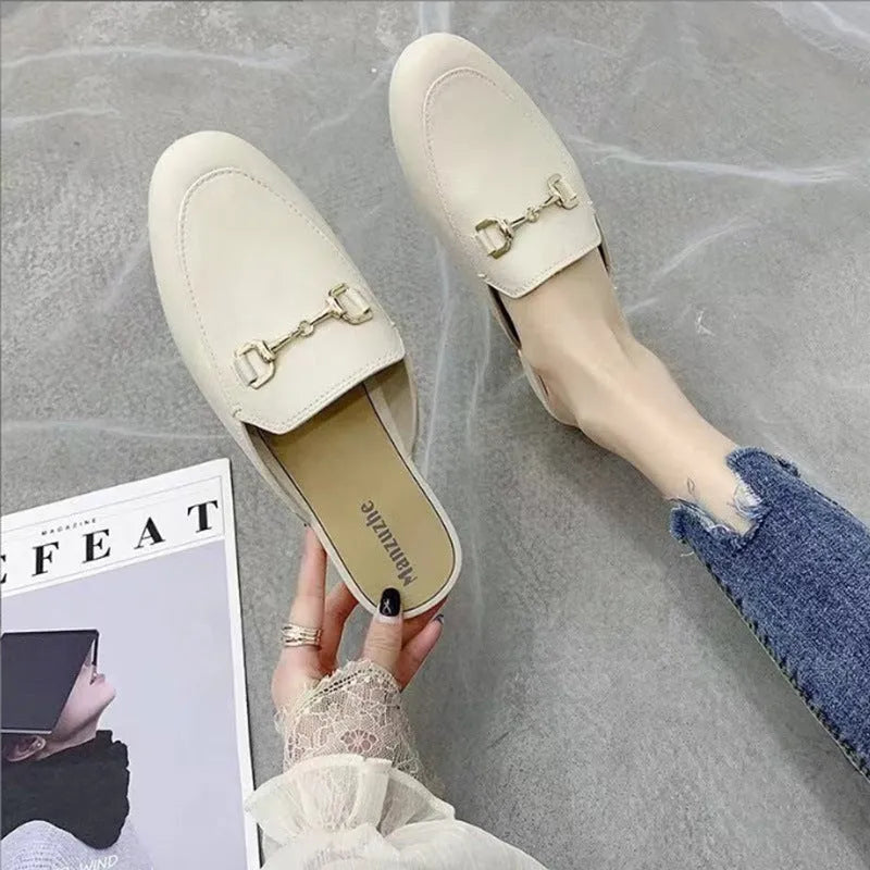 Women's closed toe half slippers in PVC with round toe and buckle fastening in multiple colour options