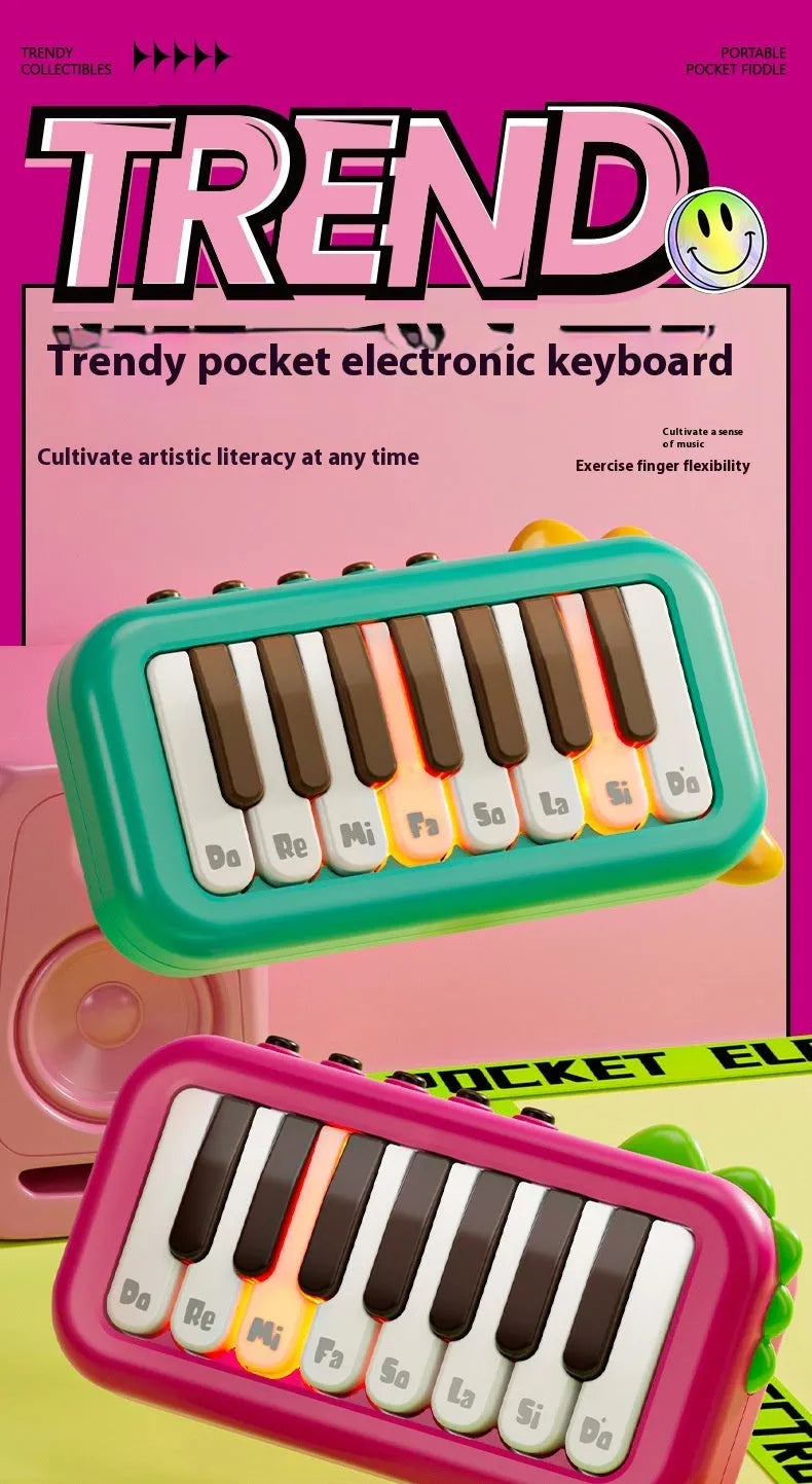 Pocket electronic keyboard toy for children in green or pink, plays little piano patterns for developmental training.