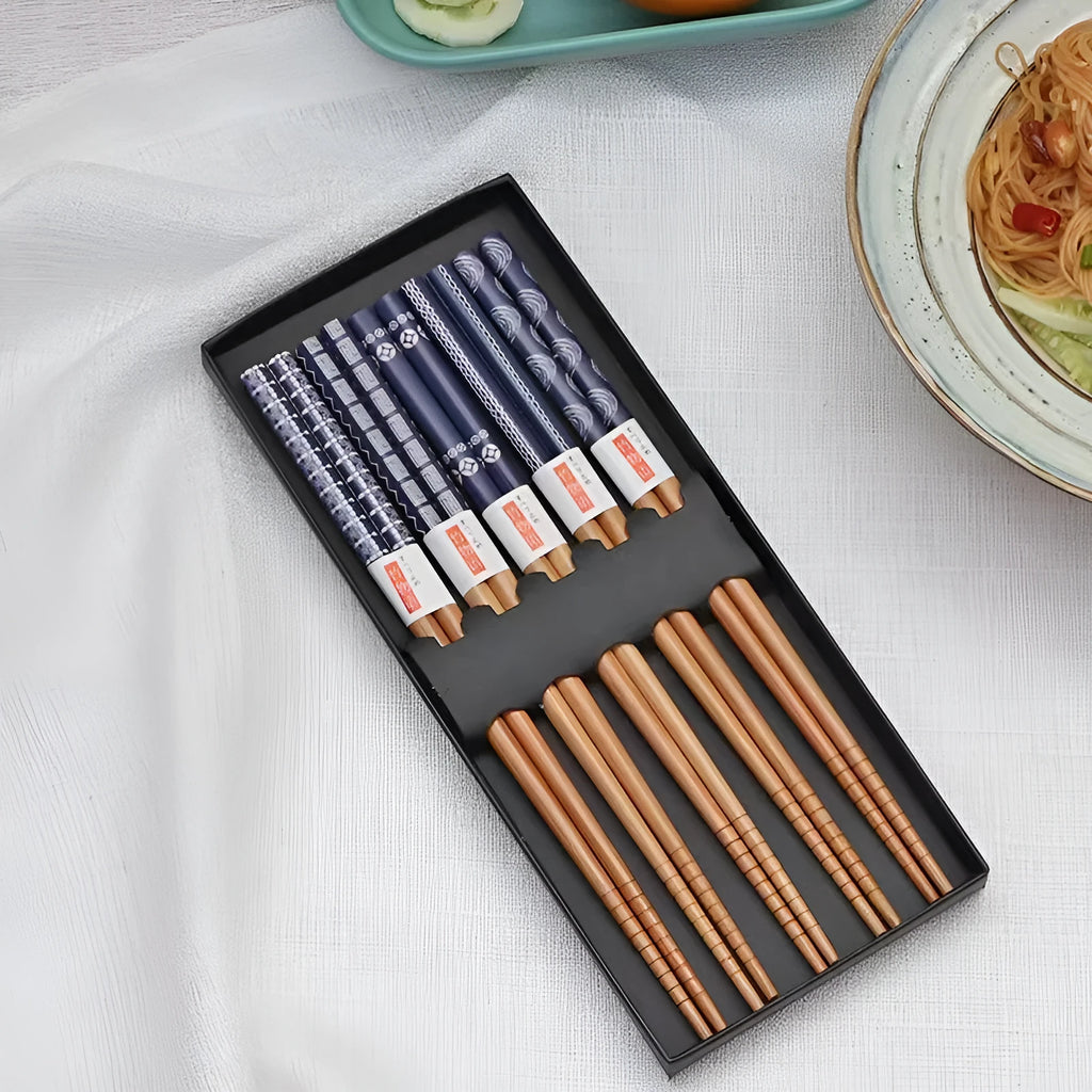 Set of five pairs of bamboo chopsticks with Japanese Lucky Cat and blue wave patterns in a gift box.
