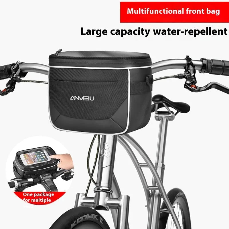 Black polyester bicycle handlebar bag with quick-release straps mounted on bicycle