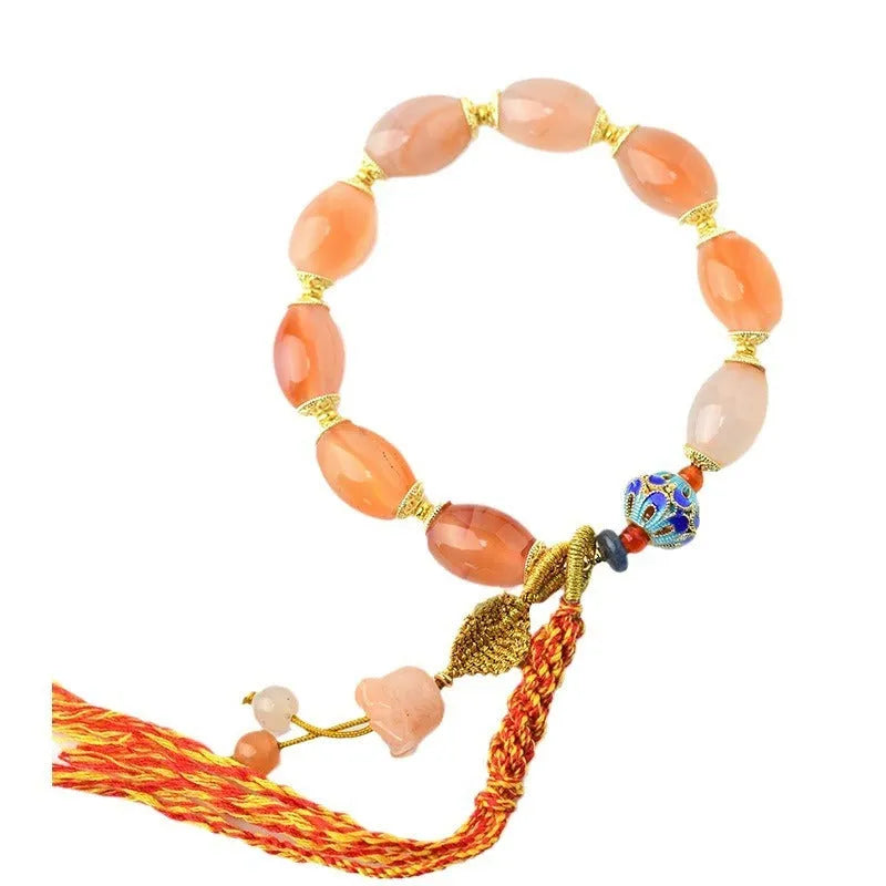 Vintage ethnic style jinsi jade agate Tibetan bracelet with floral and geometric shapes.