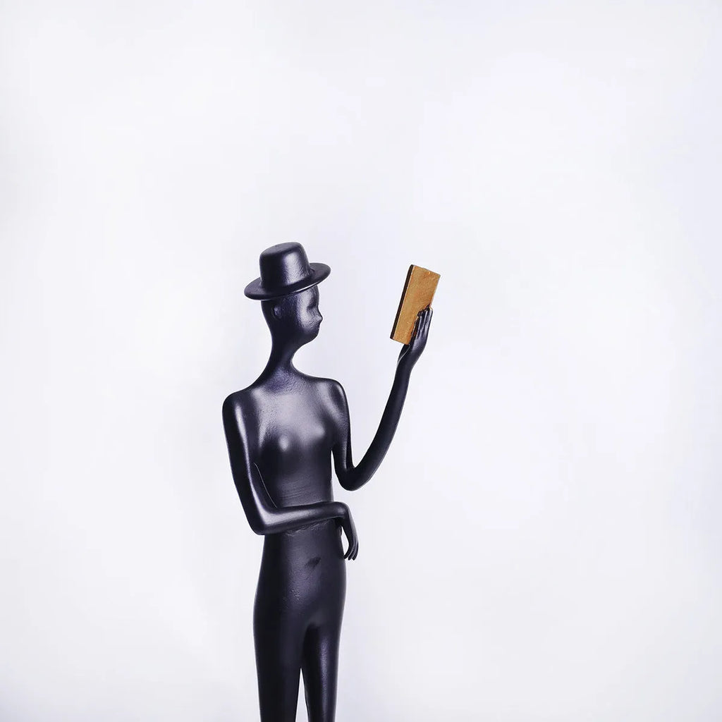 Black aluminium reading woman desktop sculpture modern minimalist design