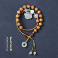 Hand-woven ebony women's bracelet with double ring adjustable closure and ruyi decoration