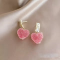 Alloy heart peach design candy stud earrings in pink or blue colour options
