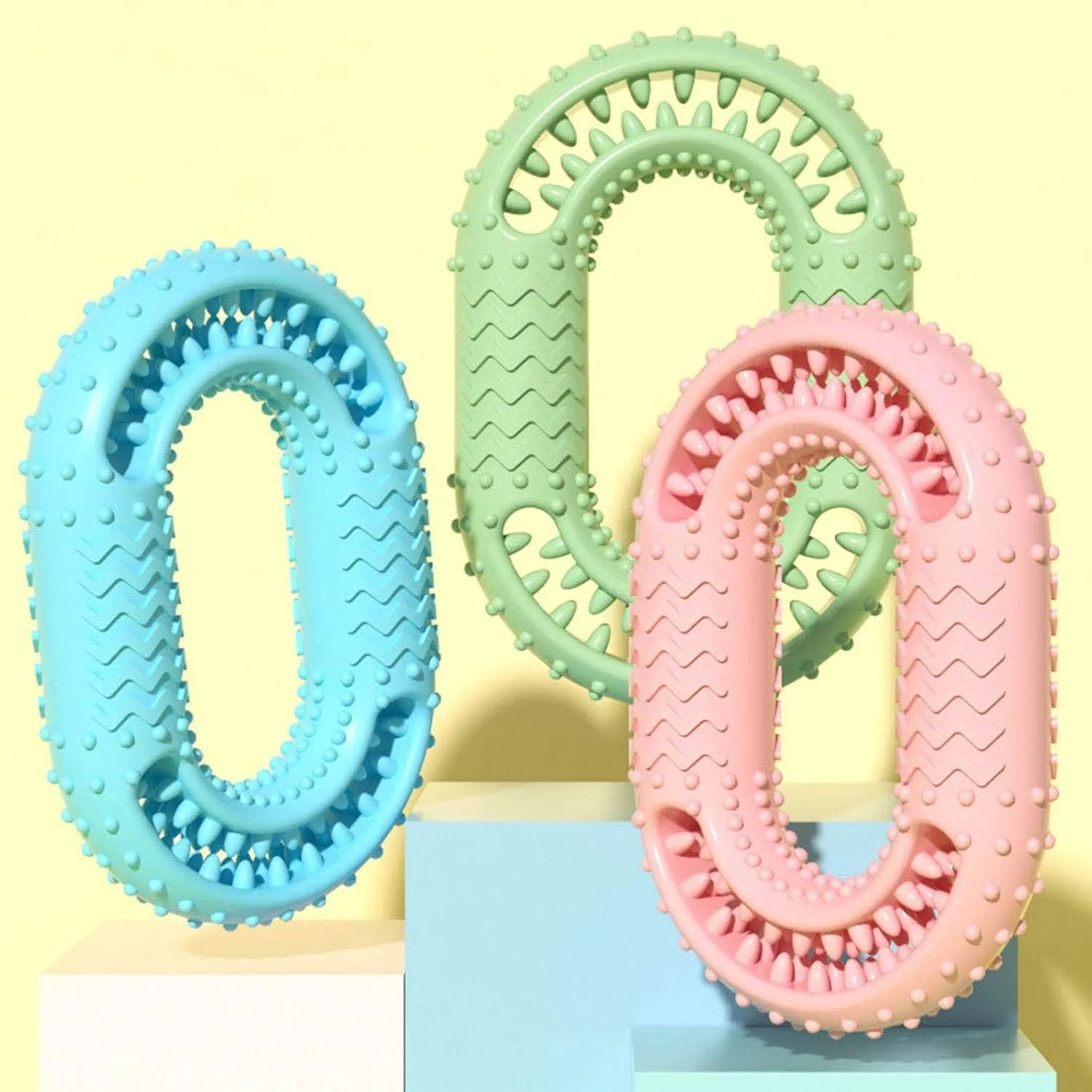Blue O-ring shaped dog chewing toy for large breed aggressive chewers on a plain background