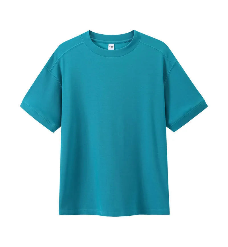 Short-sleeved loose-fit cotton pique T-shirt for youth in solid colour options