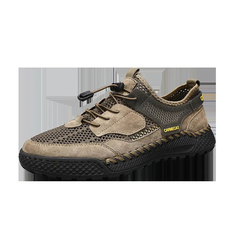 Men's grey suede low-top trainers with elastic band and hand-stitched rubber sole.