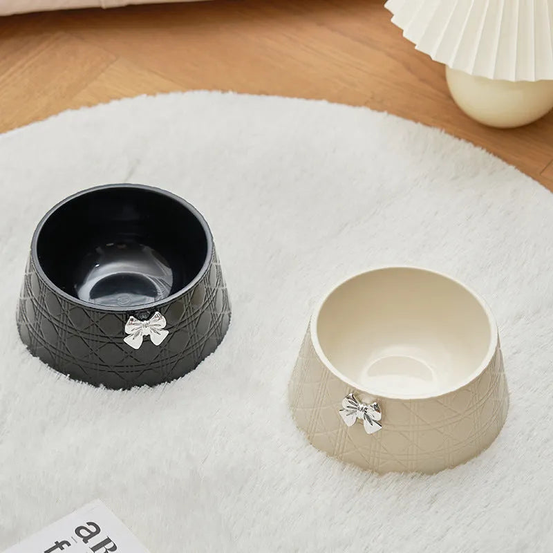 Diamond pattern pet bowl with bowknot design in pink and silver colours