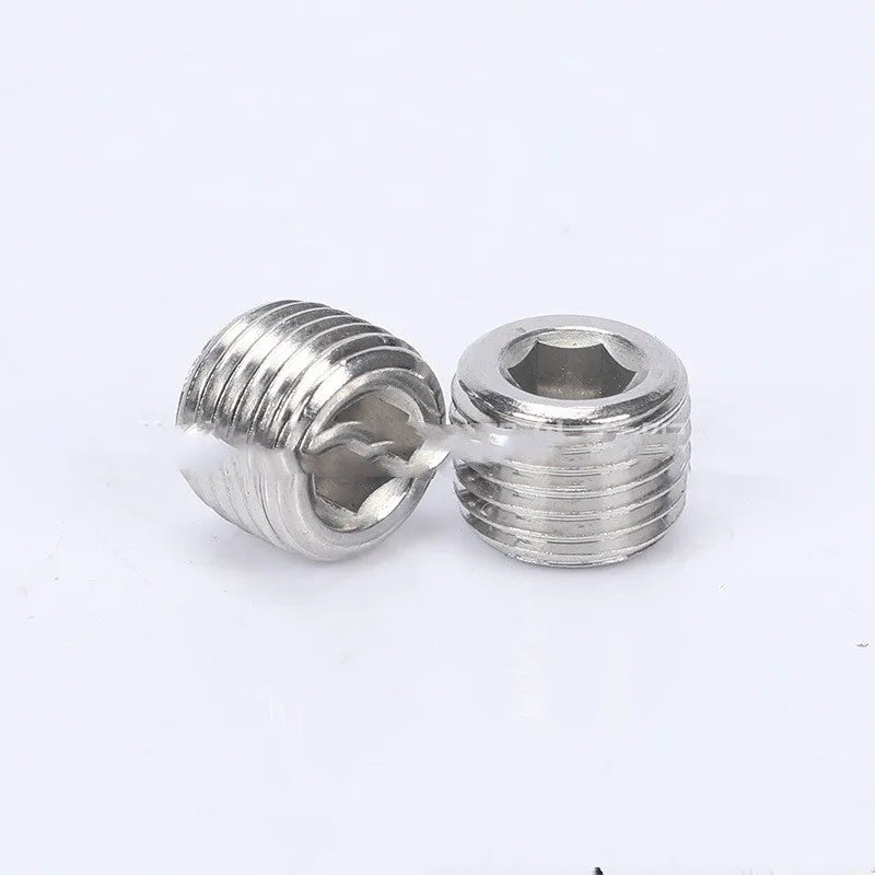 Stainless steel hexagon plug for 3/8 inch bulkhead pipe fittings on a white background.