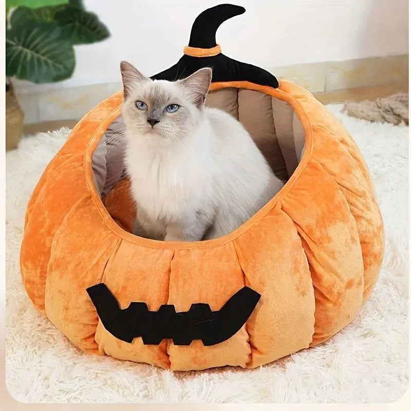 Halloween pumpkin-shaped cat bed with cartoon devil design in soft plush material