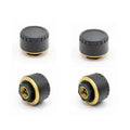 Four black Bluetooth tyre pressure sensors for car with mobile phone display showing pressure readings