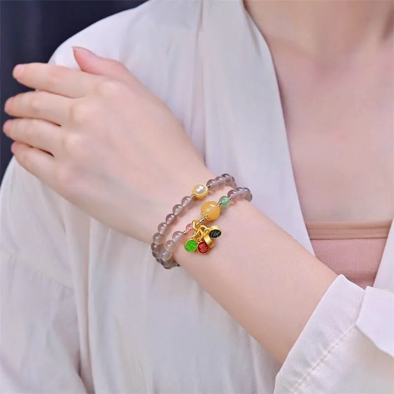 Natural grey agate women's bracelet with two-circle design showing safe and happy symbolism