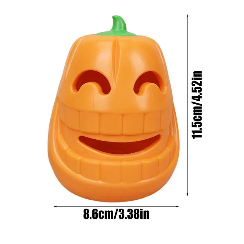Yellow pumpkin-shaped tough TPR chew toy for dogs on a white background.