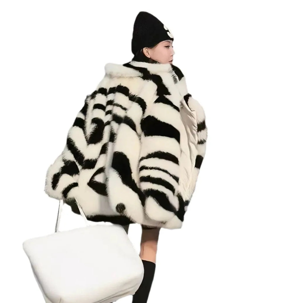 Women's zebra stripe fur top with skimmer collar and long sleeves