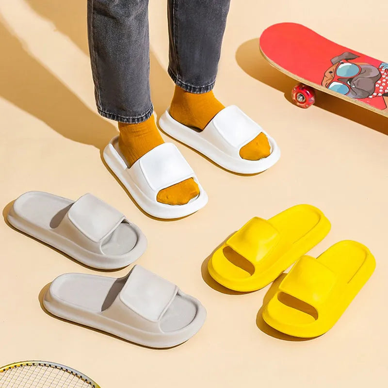A pair of soft, thick-soled EVA flip-flop slippers in a chosen colour, showing the non-slip tread pattern on the sole.
