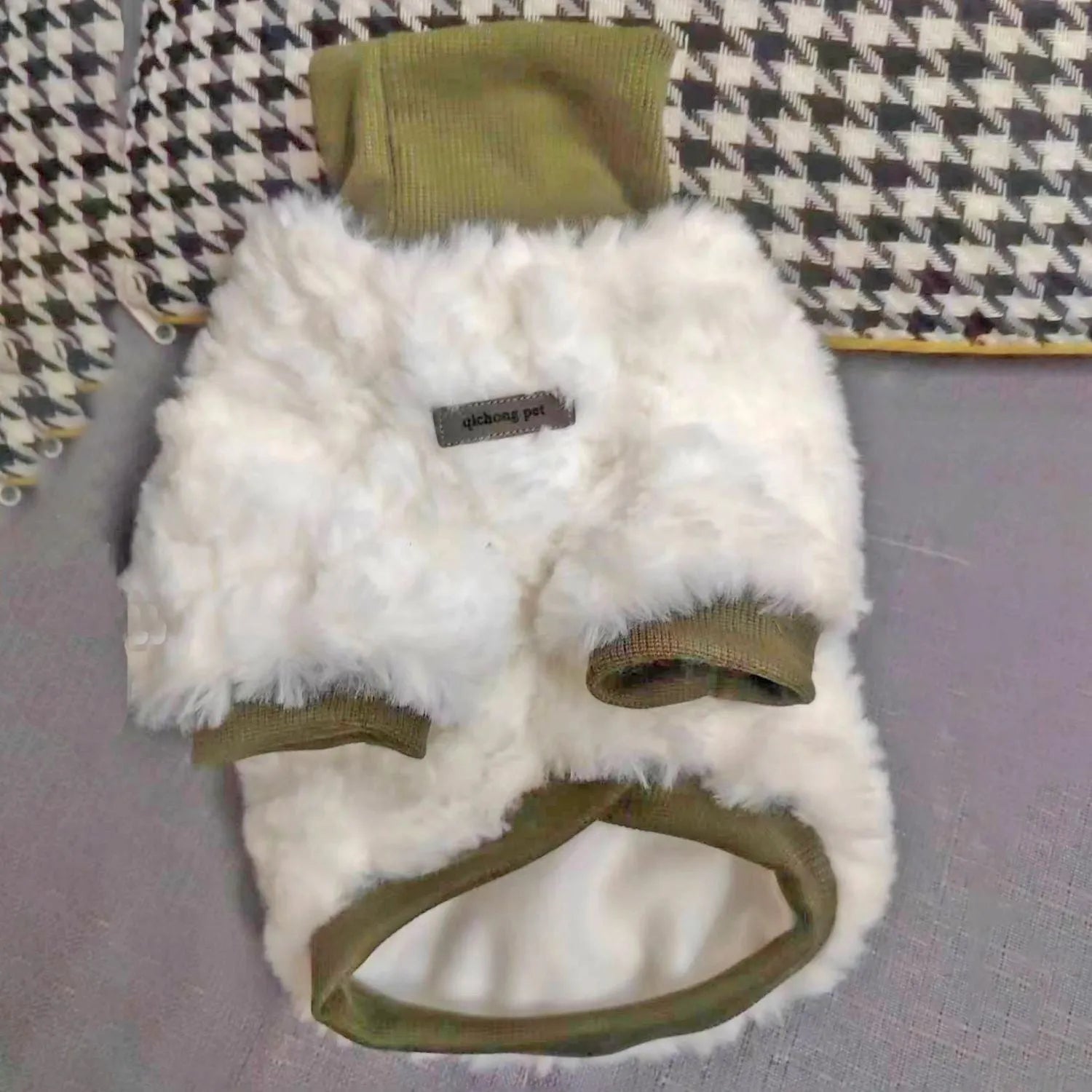 Creamy green turtleneck plush dog coat on small pet showing high collar design and cotton padding
