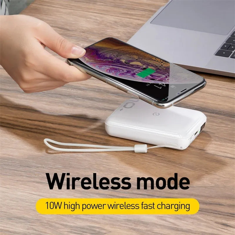 Small square black wireless fast charging power bank with digital display showing battery percentage