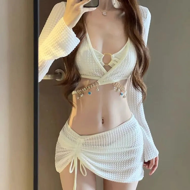 Women's long sleeve black and white bikini swimsuit made from polyester for swimming and wading