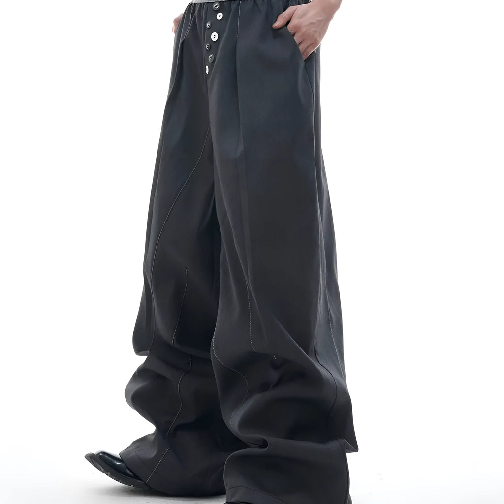 A pair of high-waisted straight-leg casual trousers in grey with a button fly front.
