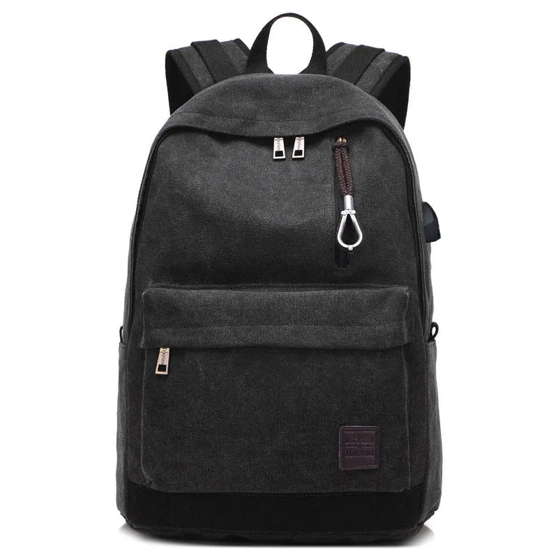 Coffee-coloured canvas backpack with USB charging port and multiple compartments.