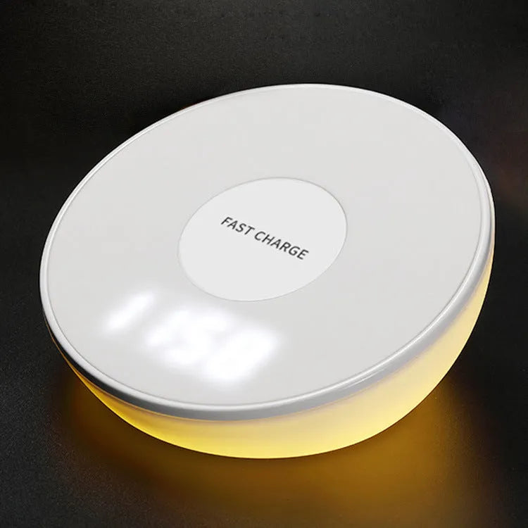 White wireless charging pad with digital clock display and control buttons for smartphone charging