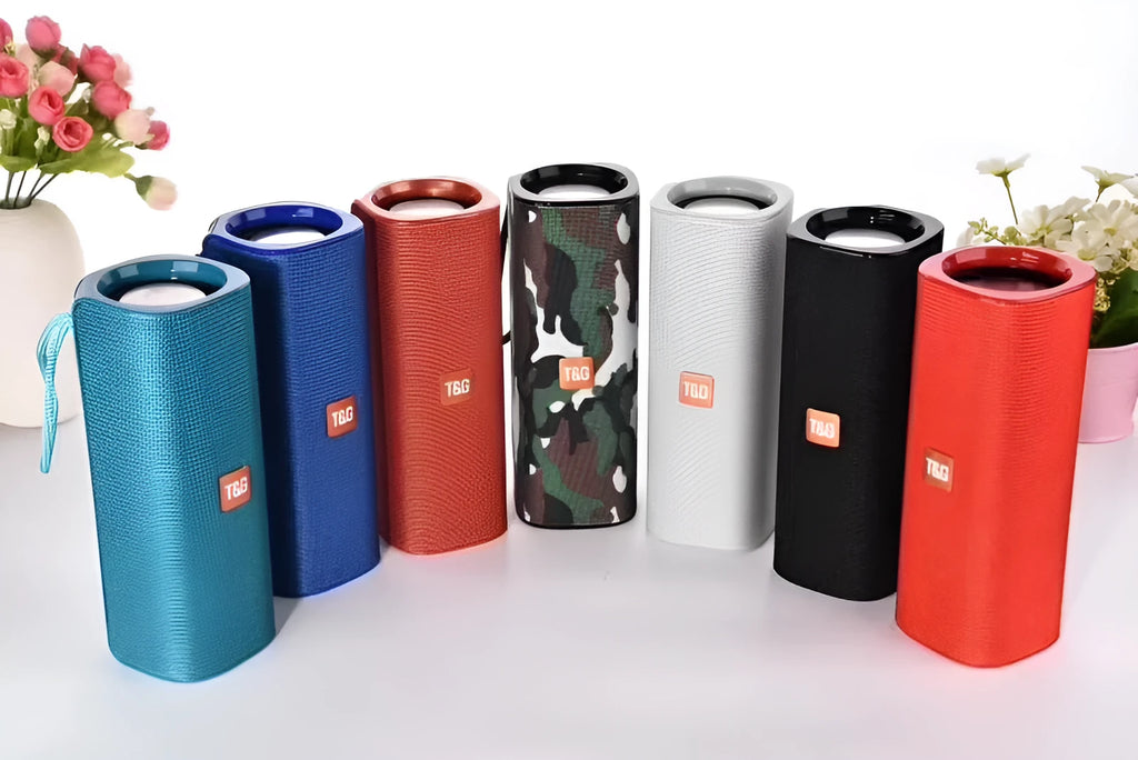 Fabric-covered portable Bluetooth speaker with USB port and control buttons
