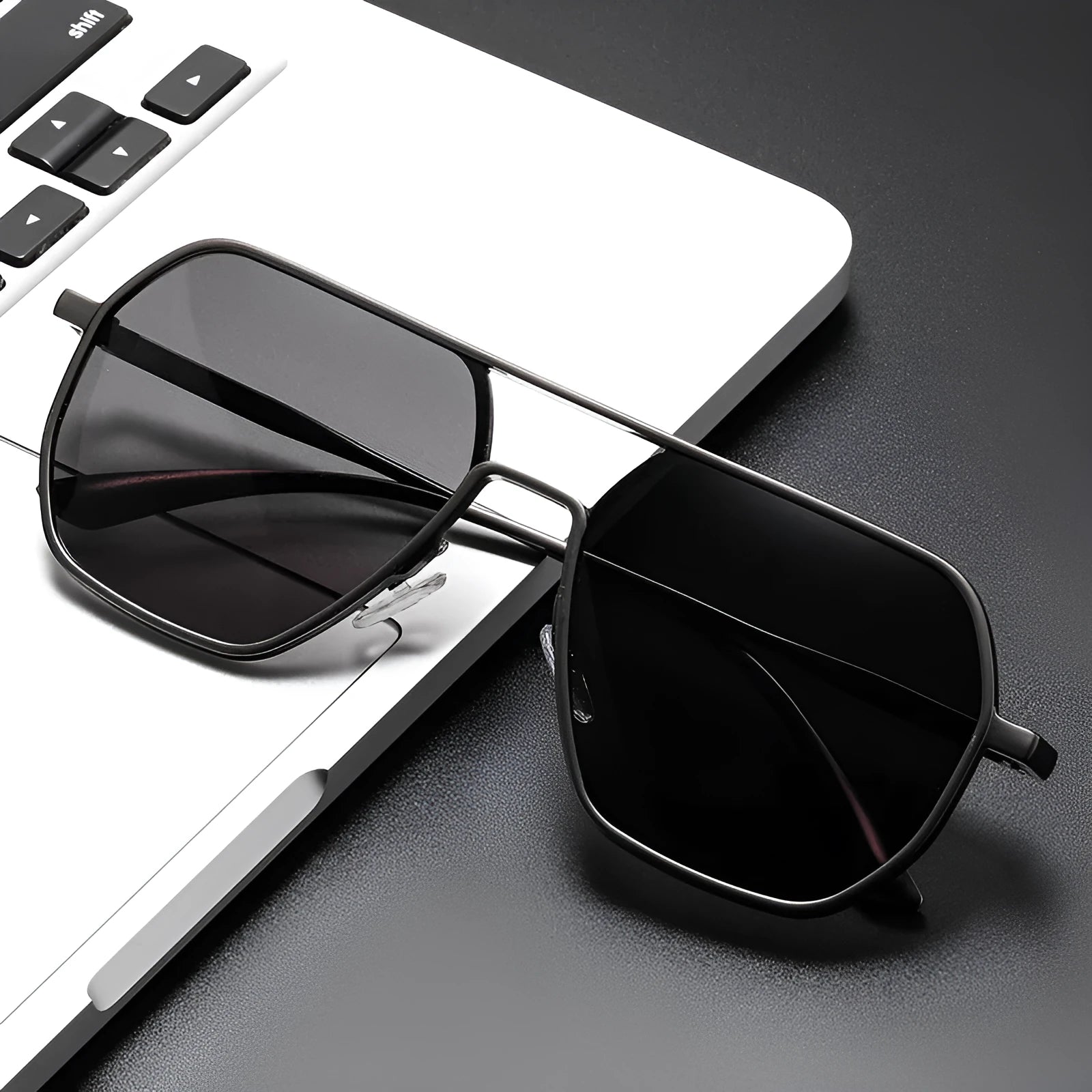 Polarised sunglasses for men in black frame with grey lenses, suitable for driving and UV protection.