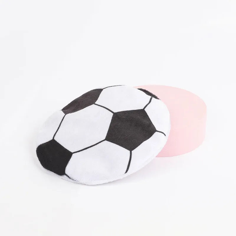 Soft plush cat toy with sports ball pattern, functioning as a flying disc with internal catnip and crinkle sound