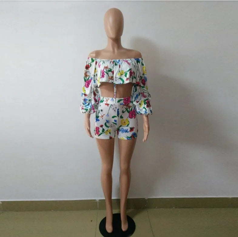 Women's multicolour digital print pyjama set with a short top featuring fluffy long sleeves and matching shorts.
