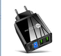 Black or white dual USB travel charger with interchangeable EU UK US plugs