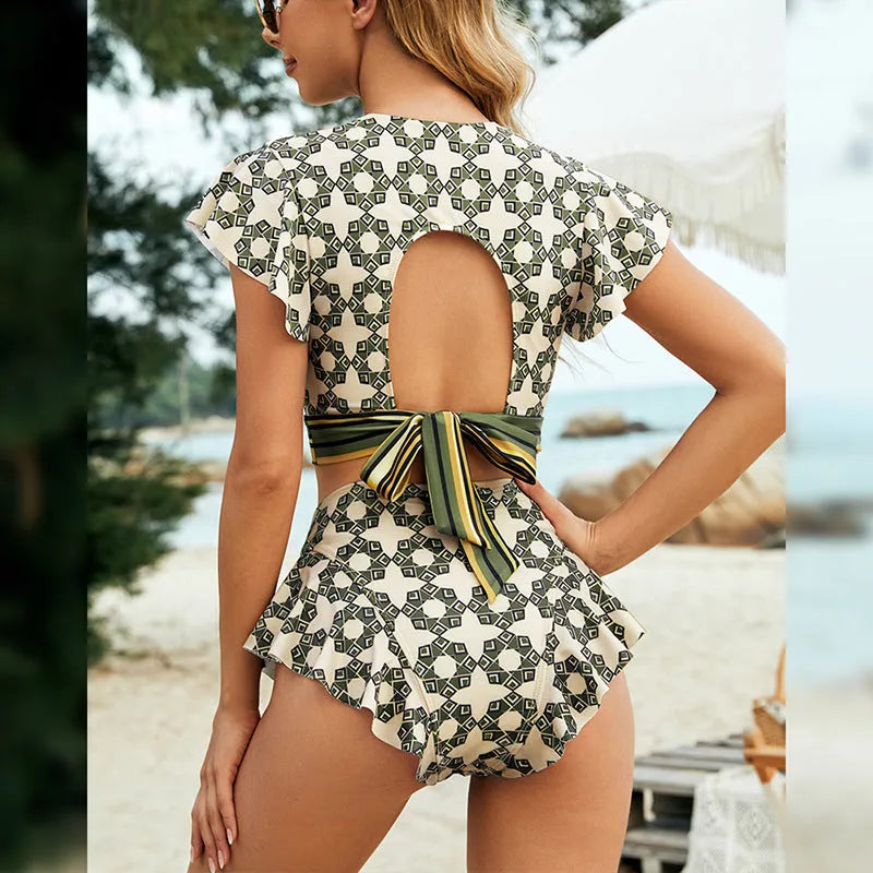 Green flounced backless lace-up V-neck bikini swimsuit with split design for swimming.