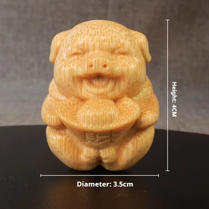 Solid bamboo carving ornament with ingot-shaped pig design measuring 4cm height
