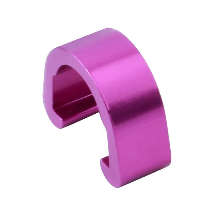 Ten small aluminium C-shaped buckles in assorted colours including black, blue, gold, and red.