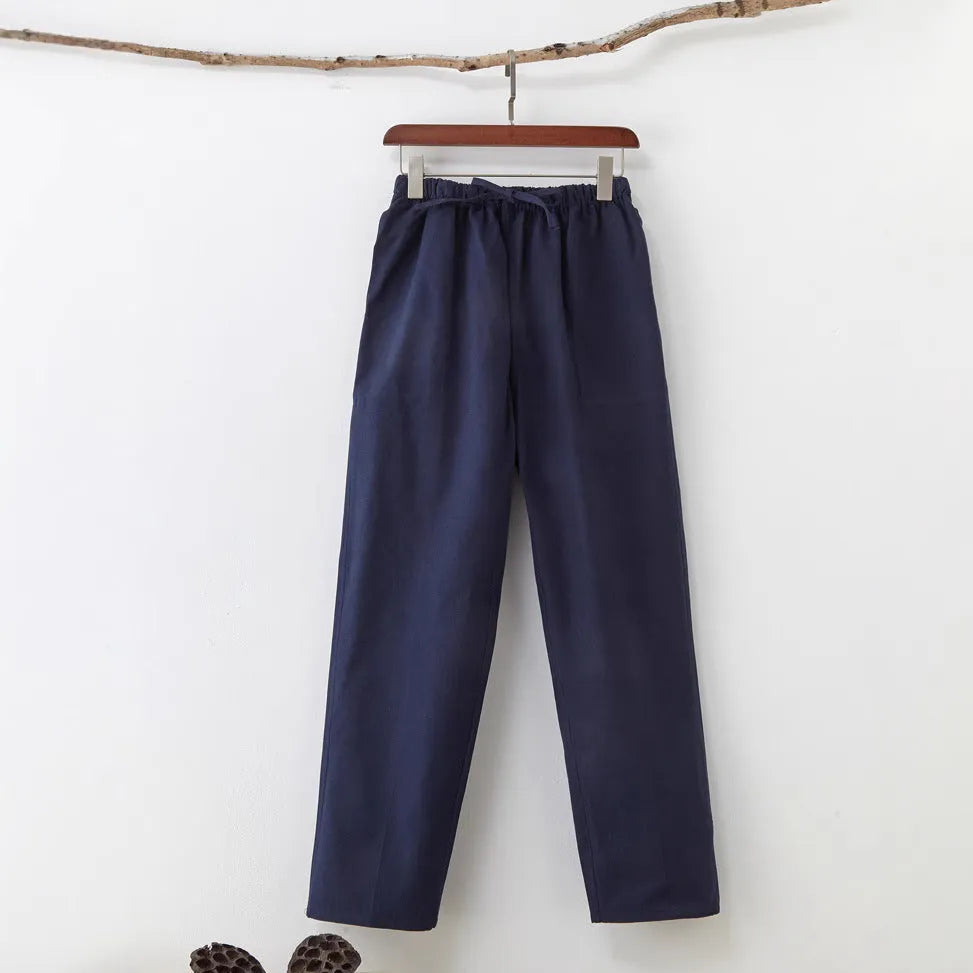 Men's beige pure cotton casual trousers with a drawstring waist on a mid-rise fit.