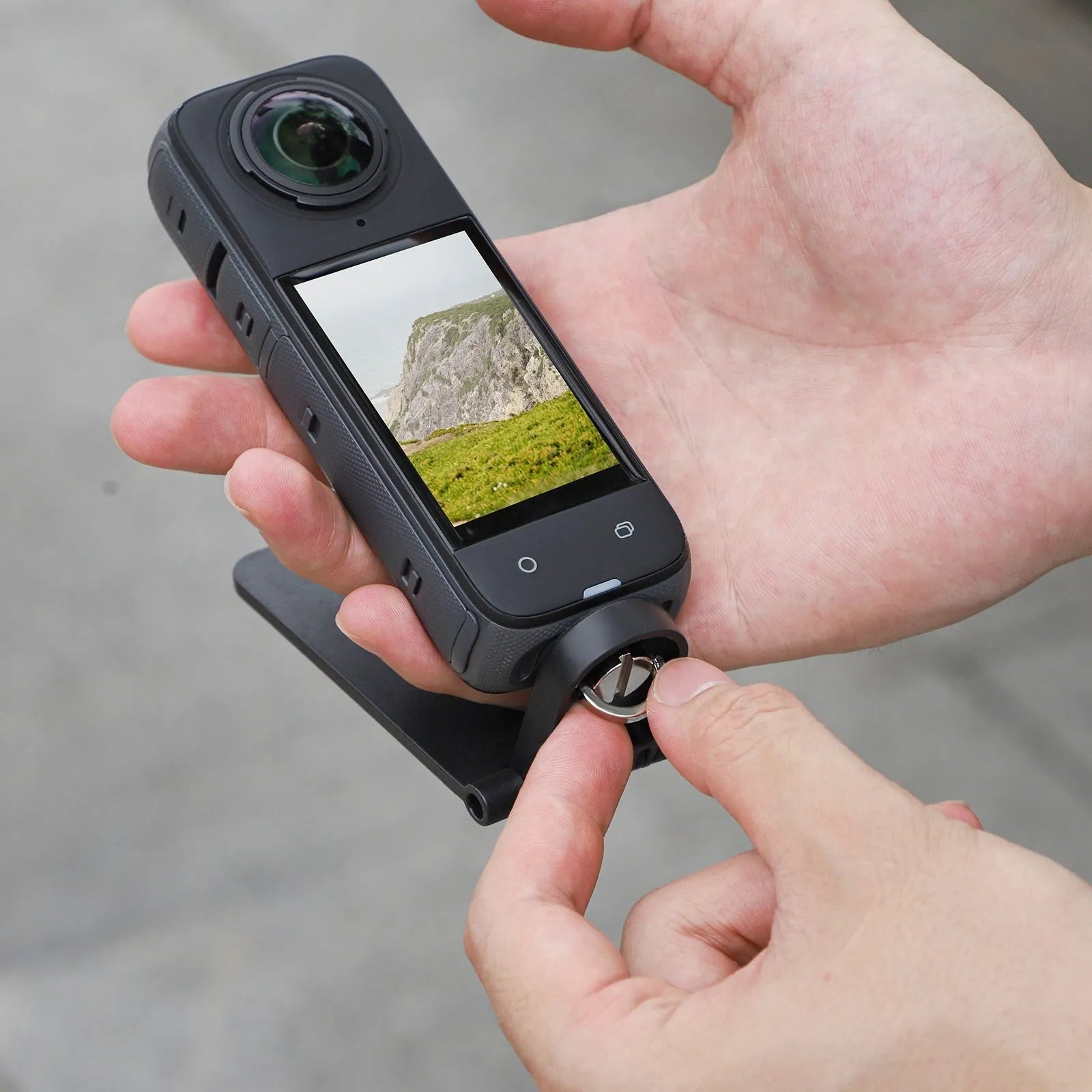 Black magnetic bracket base with adjustable angle handle for Insta360 X4 camera