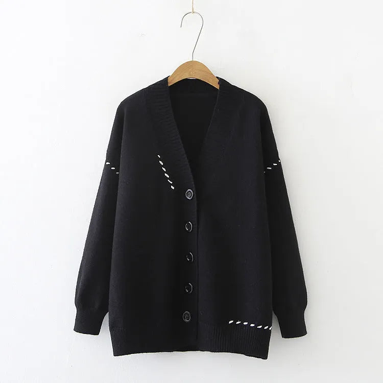 Women's loose-fit knitted cardigan coat in black or white, long sleeve