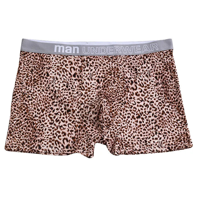 Men's loose leopard print underwear in milk silk polyester fabric showing mid-waist design