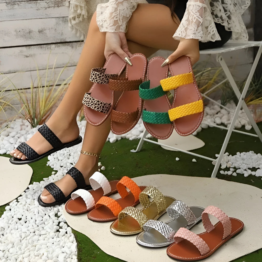 Women's woven synthetic leather beach slippers with PVC sole in gold colour