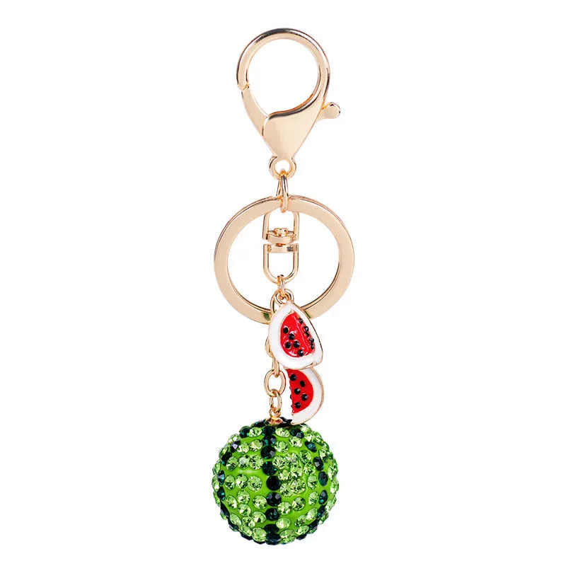 Green zinc alloy watermelon-shaped keychain measuring 12cm.