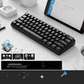 RK 61 wireless mechanical keyboard with white keycaps showing multimedia symbols, placed on a wooden desk.