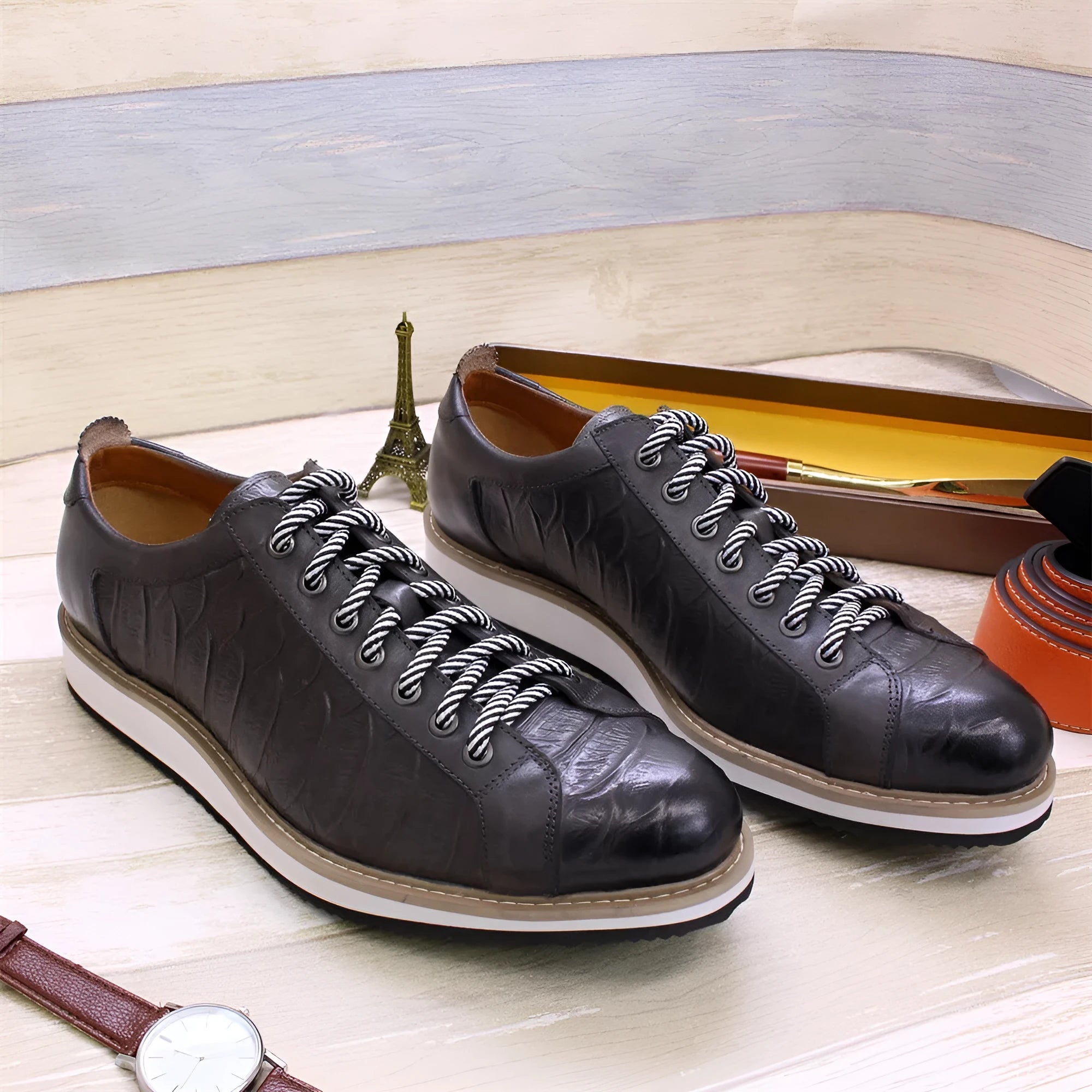 Men's low-top handmade shoes with an embossed pattern and front lace closure, shown in multiple colours.