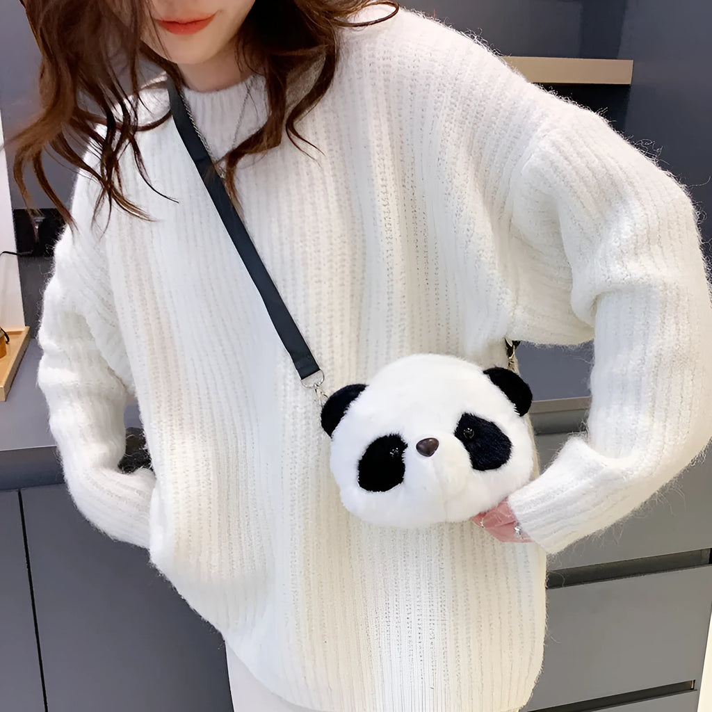 Soft plush panda head cylindrical crossbody bag with an outer sandwich pocket.
