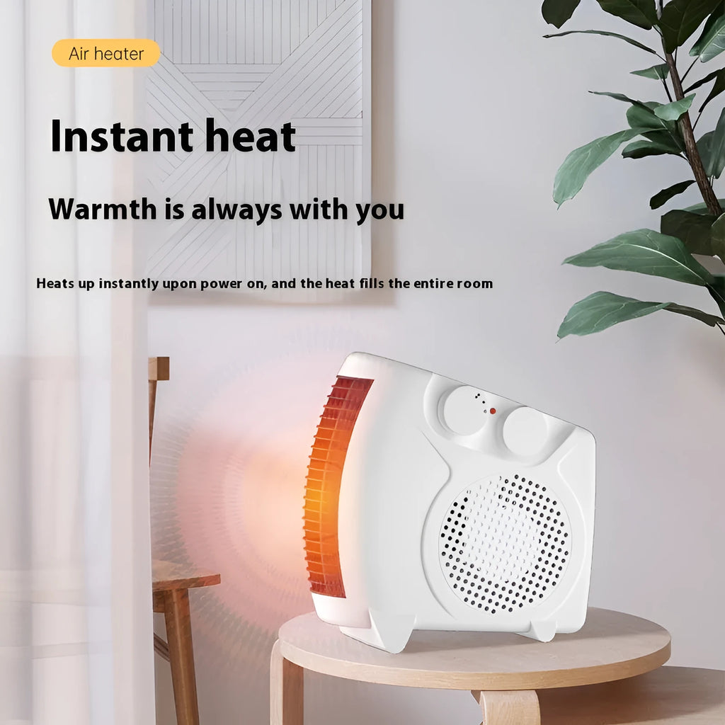 Small white desktop electric heater with power control, shown on a desk for scale