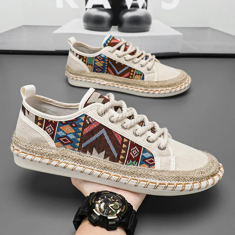 Men's summer casual shoes in beige and black with cloth uppers and slip-on design