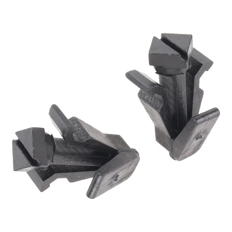 Black plastic Nissan bumper cover radiator grille fastening clip, part number 76882-0M060.
