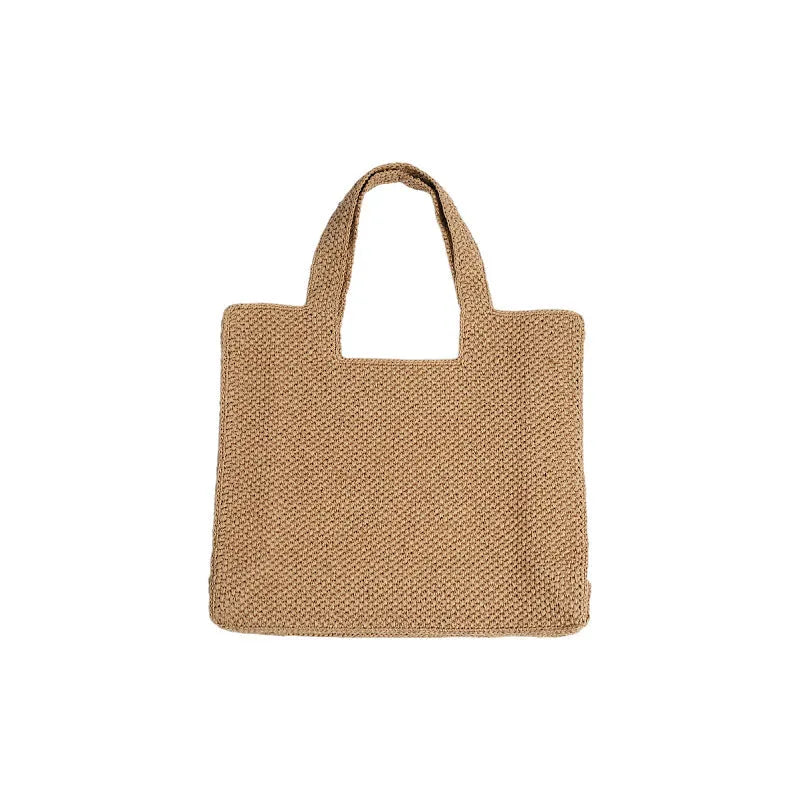 Straw woven commuter tote bucket bag with horizontal square shape and woven texture
