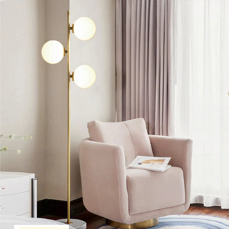 Creative minimalist floor lamp with gold aluminium alloy frame and glass detail, 155cm height, warm LED light