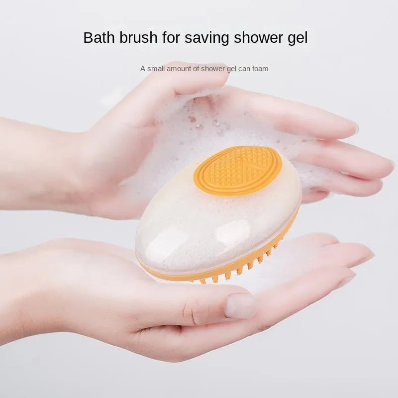 2-in-1 pet bath brush with soft silicone bristles, shampoo reservoir, and non-slip grip in pink